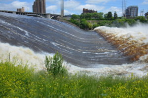 ST. PAUL, Minn. Ð The U.S. Army Corps of Engineers, St. Paul District, opens the Tainter gate at Upper St. Anthony Falls lock, in Minneapolis June 20 to reduce the flood risk upstream of the lock.